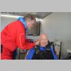 Rob securing earpiece for Mark.jpg